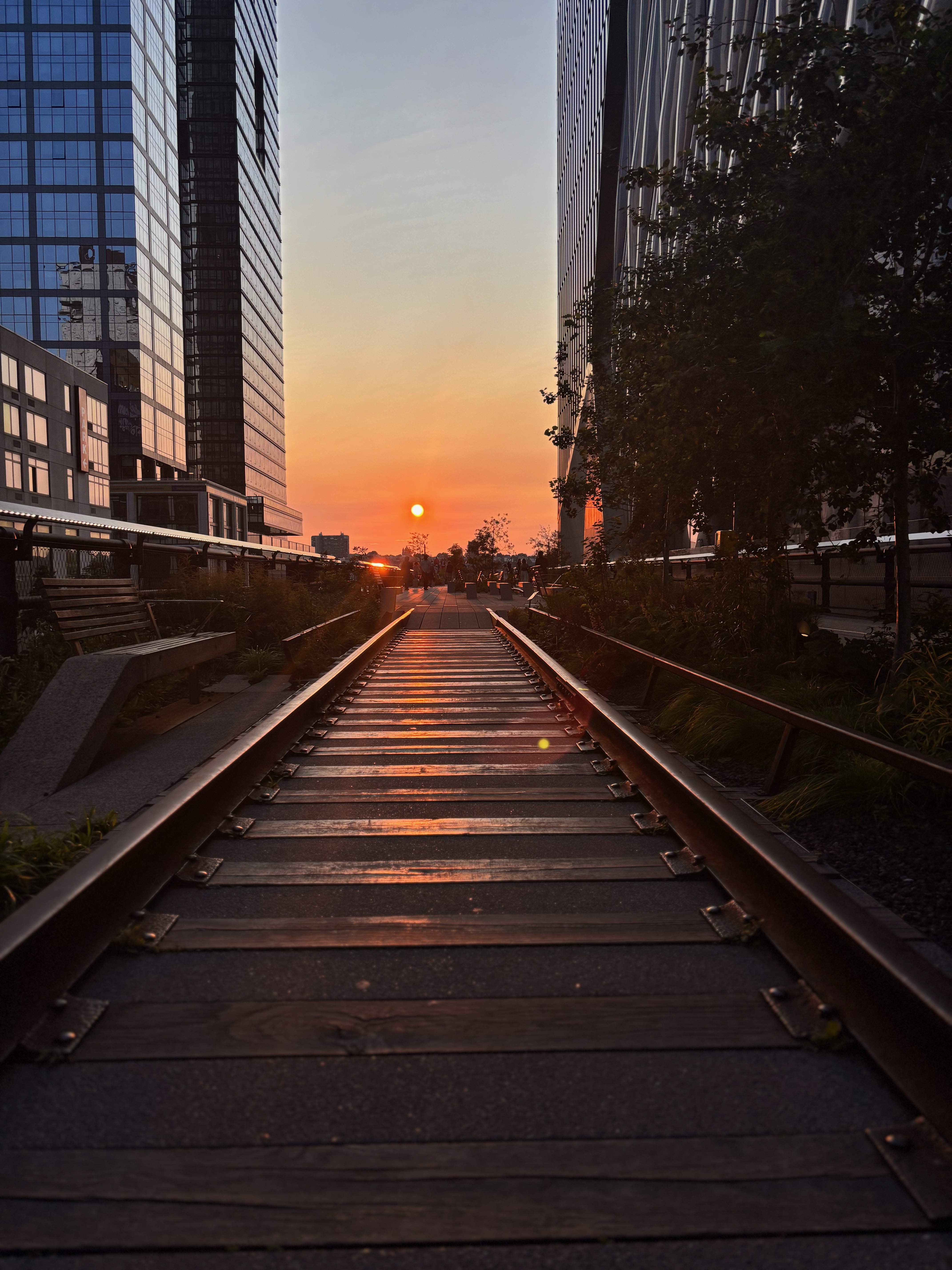 Sunrise behind railway tracks